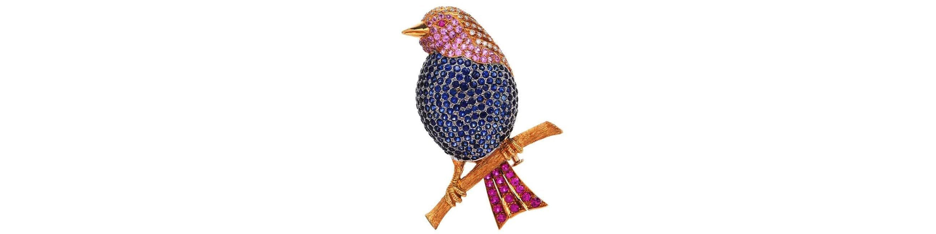 gemstone encrusted bird pin