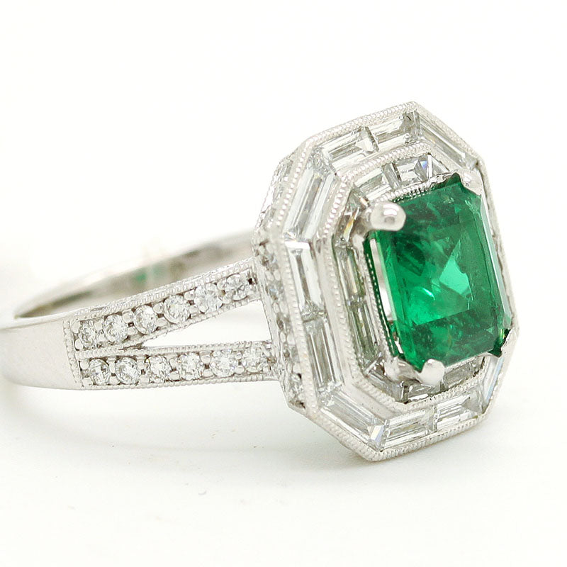Deco-Style Large Emerald Ring Surrounded By Baguette And Round Diamonds