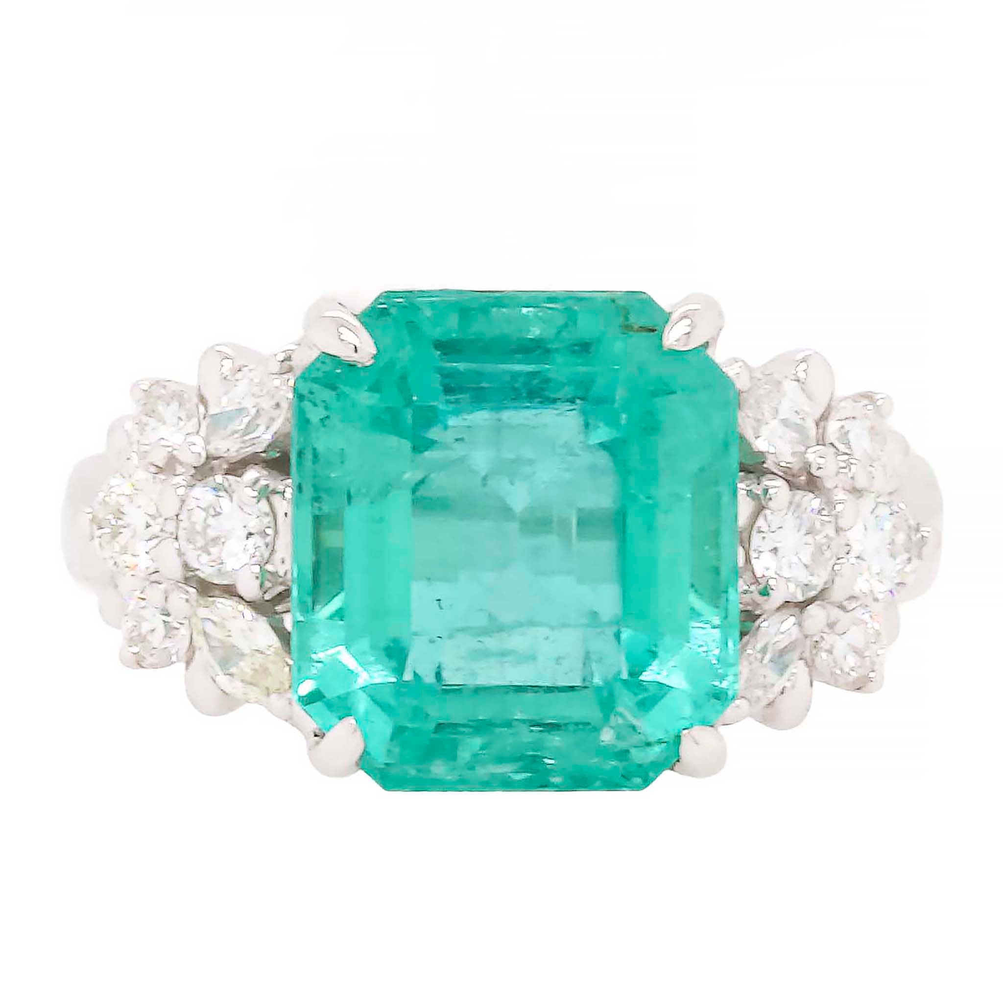 Large Emerald Ring With Ornate Diamond Mounting