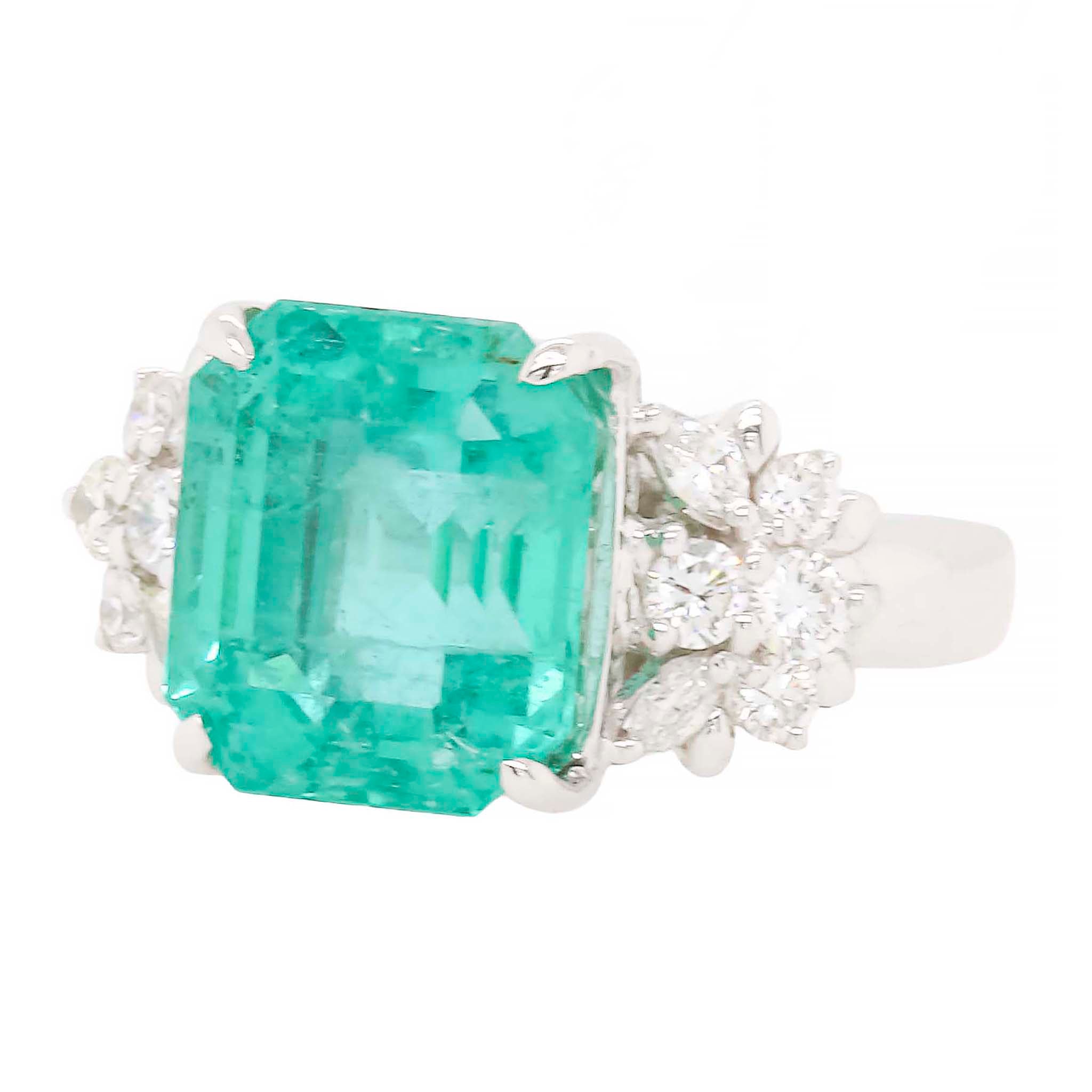 Large Emerald Ring With Ornate Diamond Mounting
