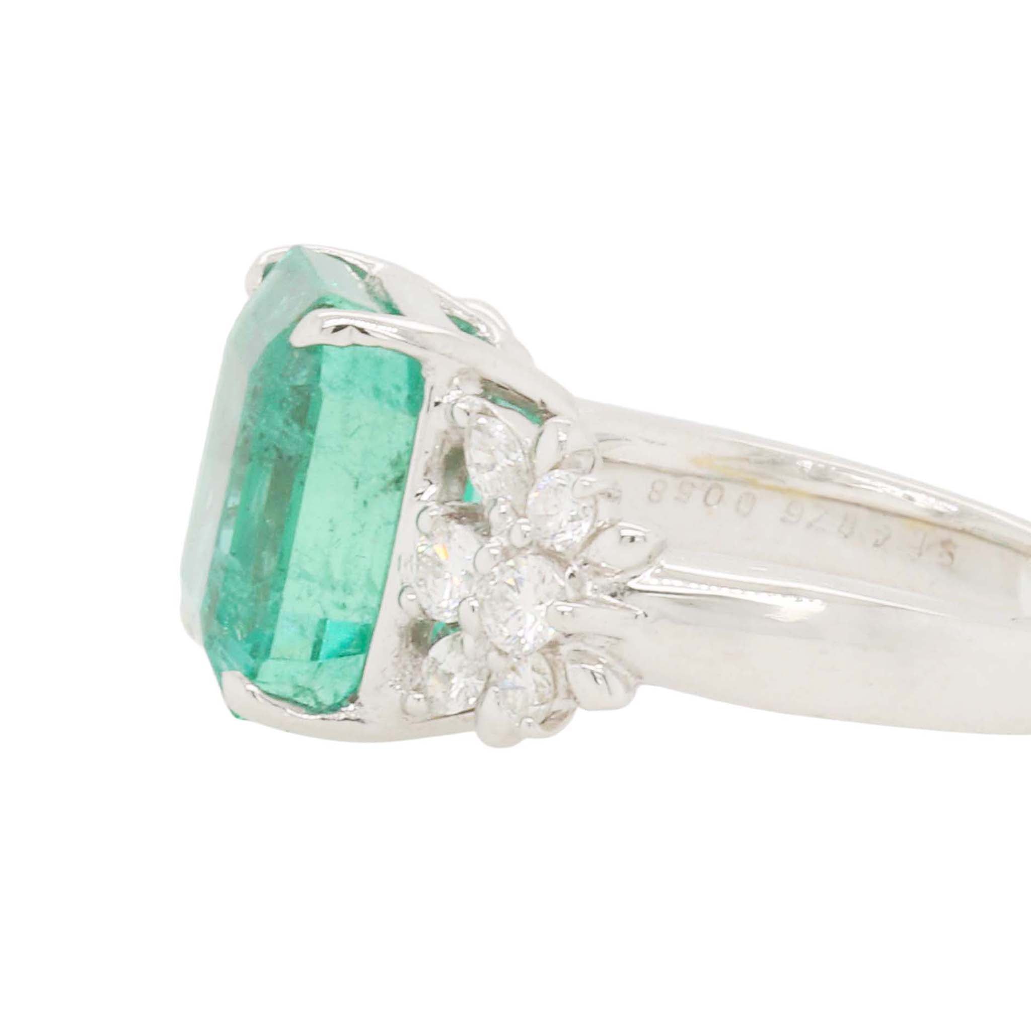 Large Emerald Ring With Ornate Diamond Mounting