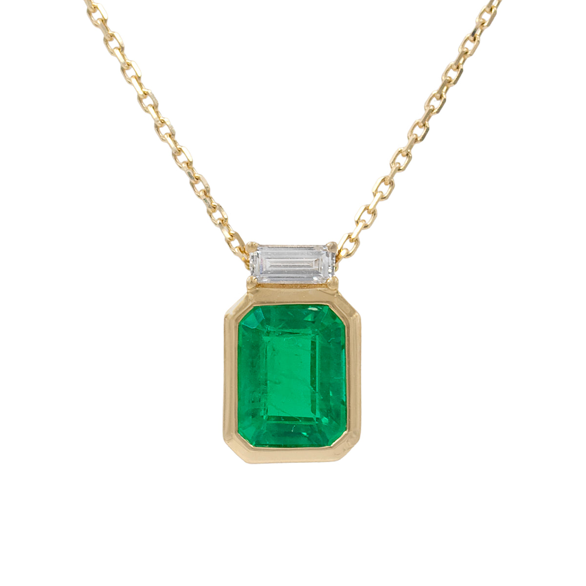 Lab Grown Emerald Cut Emerald And Lab Grown Baguette Diamond Pendant Necklace