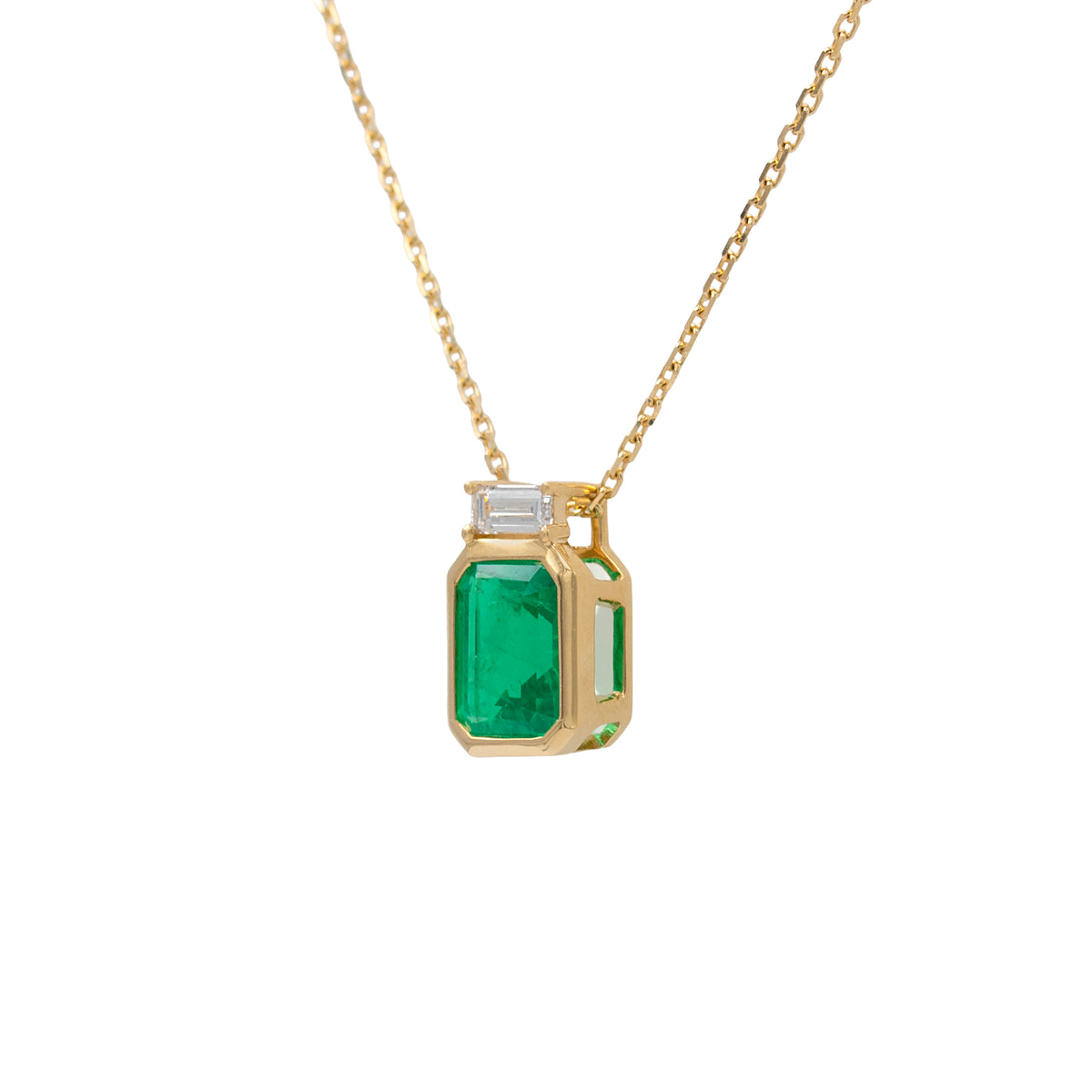 Lab Grown Emerald Cut Emerald And Lab Grown Baguette Diamond Pendant Necklace