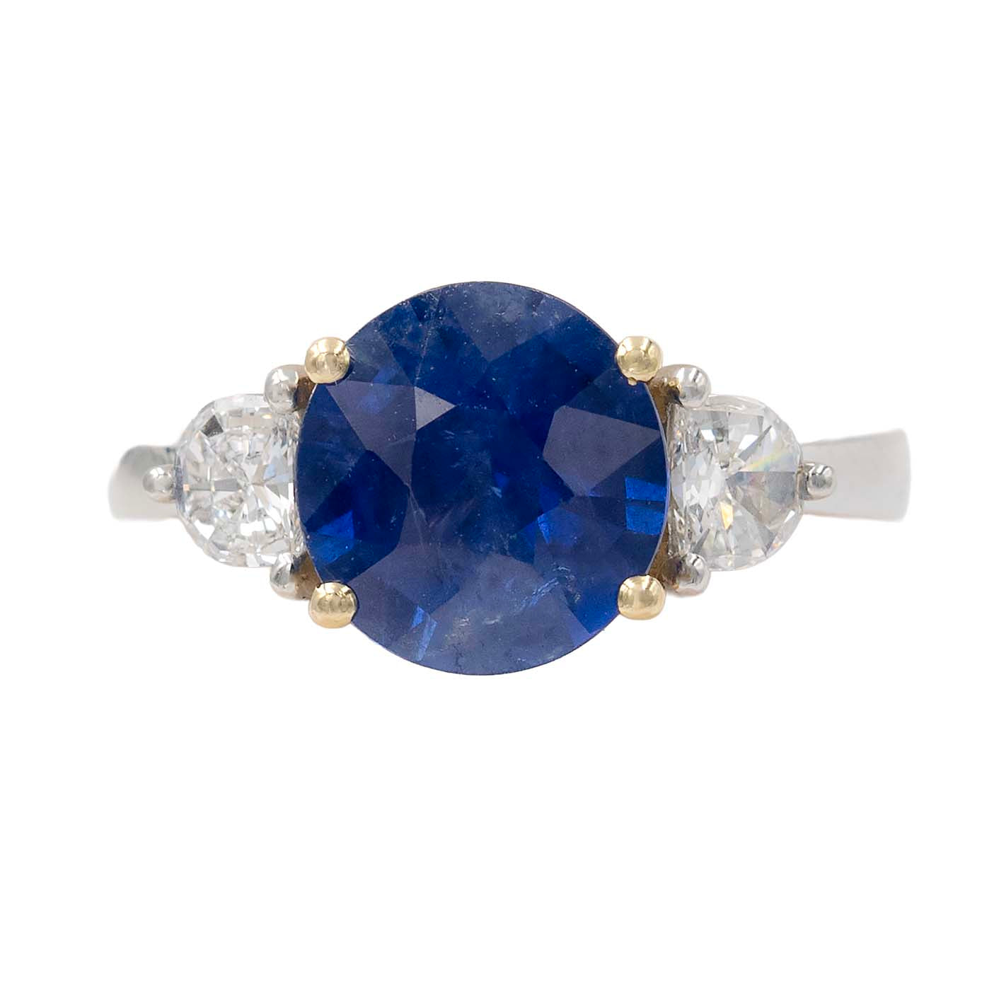 Round Sapphire With Fancy Cut Diamond Side Stones