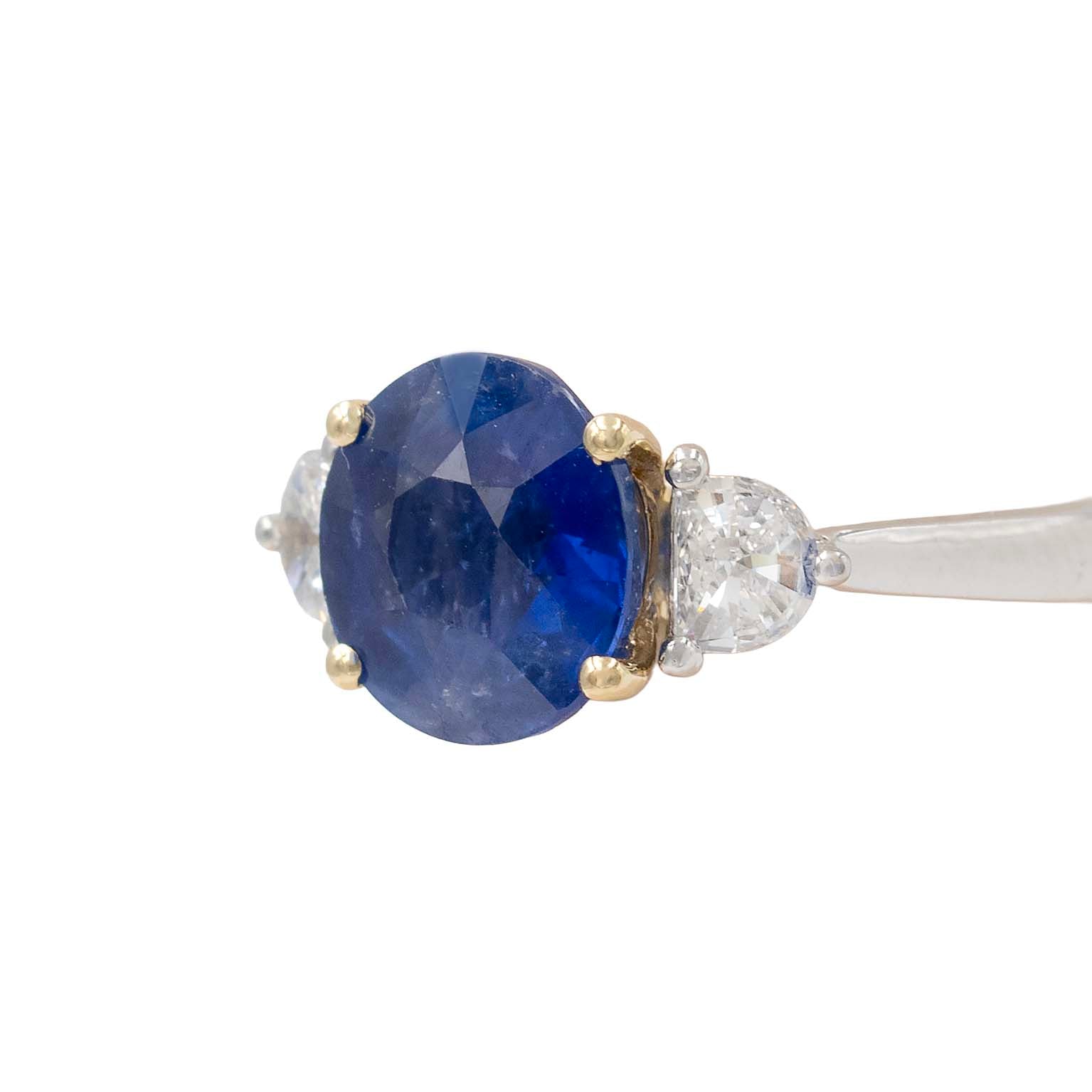 Round Sapphire With Fancy Cut Diamond Side Stones