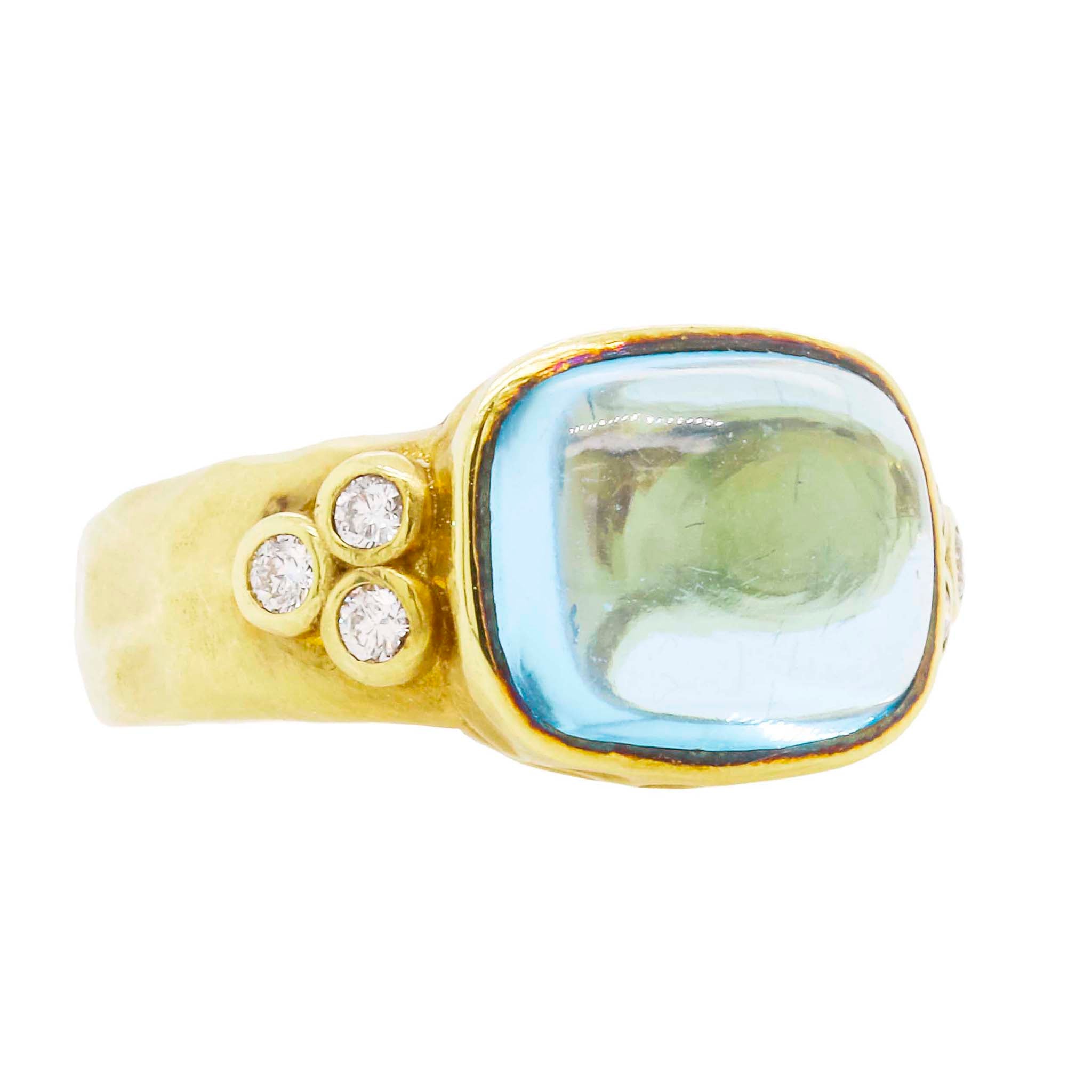 Cabochon Blue Topaz Ring In Textured Gold