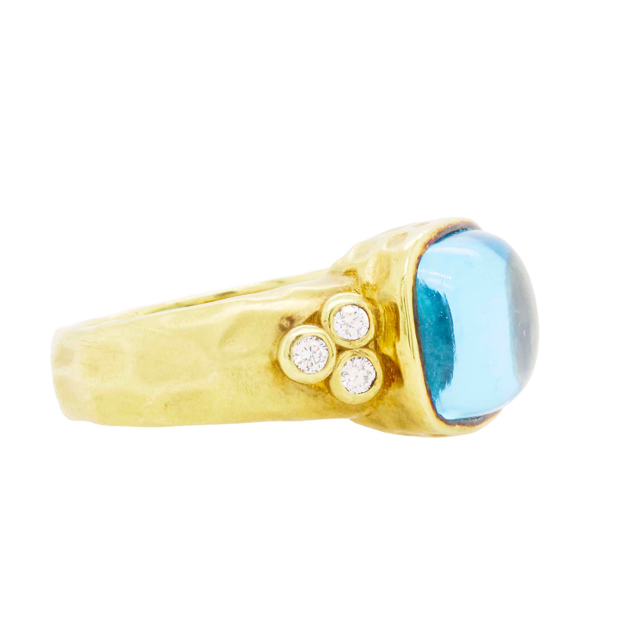 Cabochon Blue Topaz Ring In Textured Gold