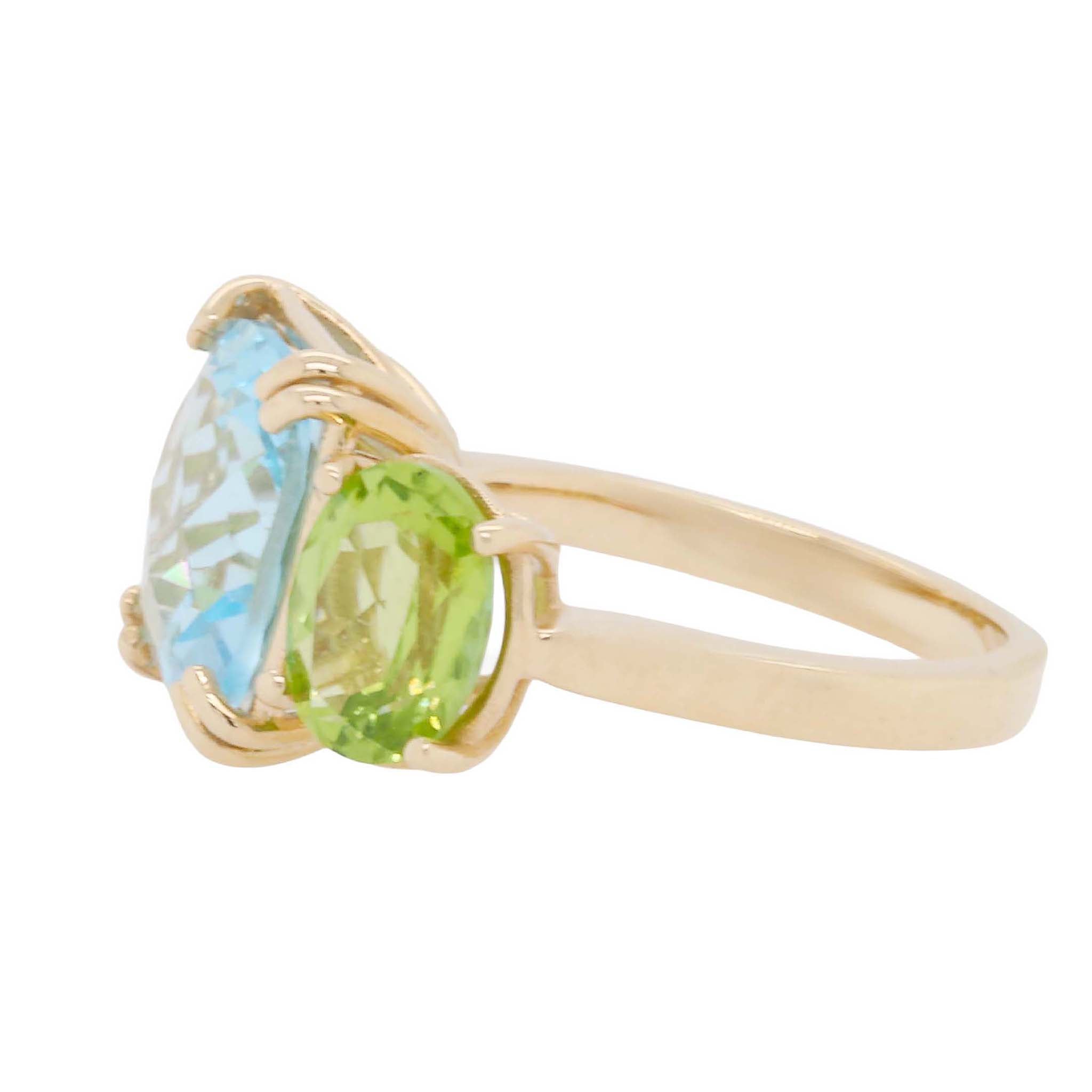 Blue Topaz And Peridot Three Stone Ring