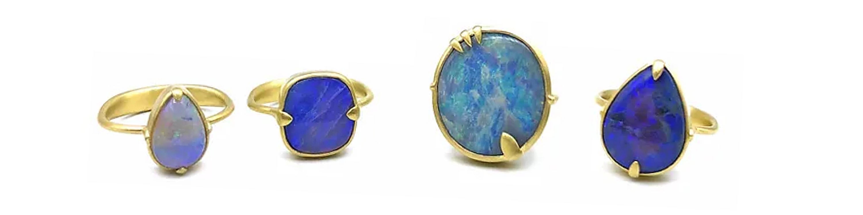 Boulder opal rings bezel set in gold