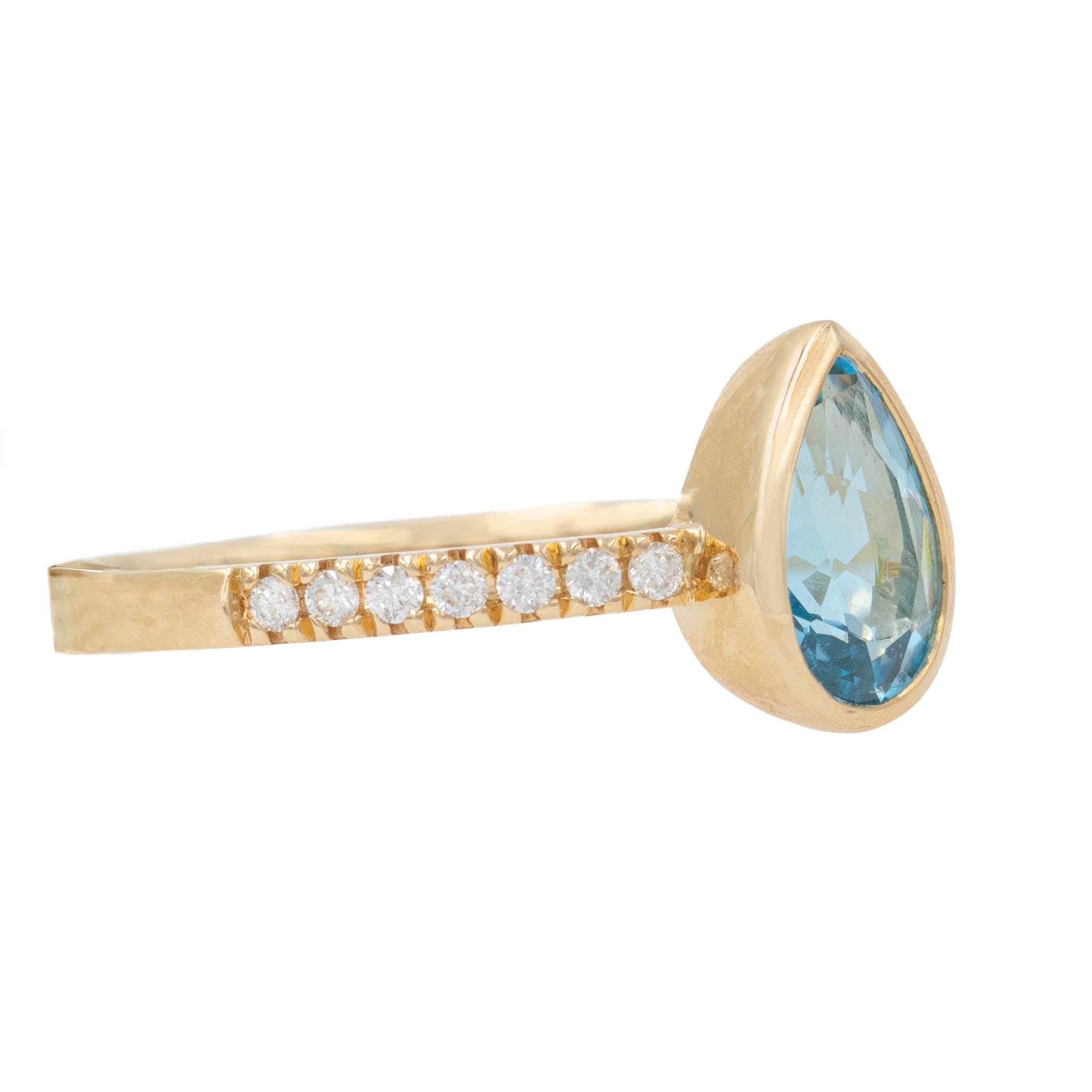 Pear Shaped Blue Topaz Ring With Diamond Shank