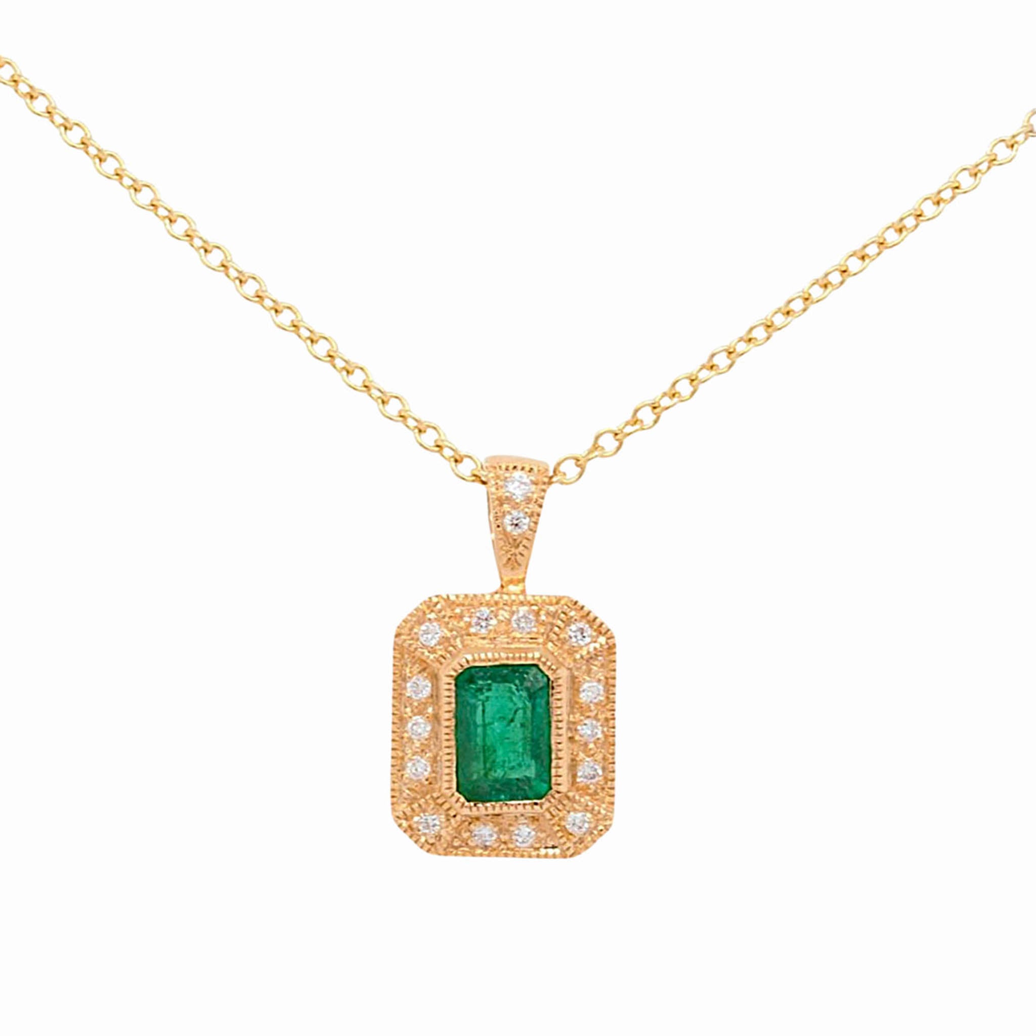 Emerald Cut Emerald With Diamond Halo Pendant In Yellow Gold