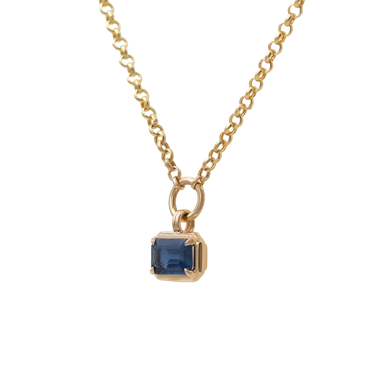 Emerald Cut Sapphire In Vintage Style Bezel Pendant