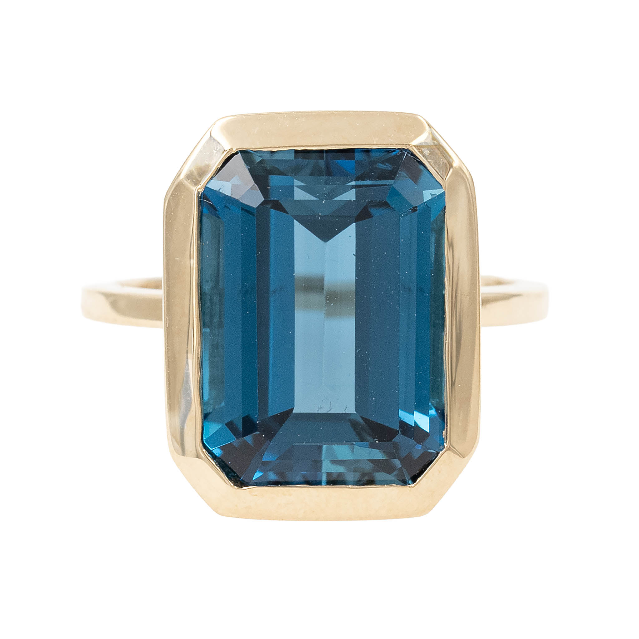 Large Bezel Set Emerald Cut Blue Topaz Cocktail Ring