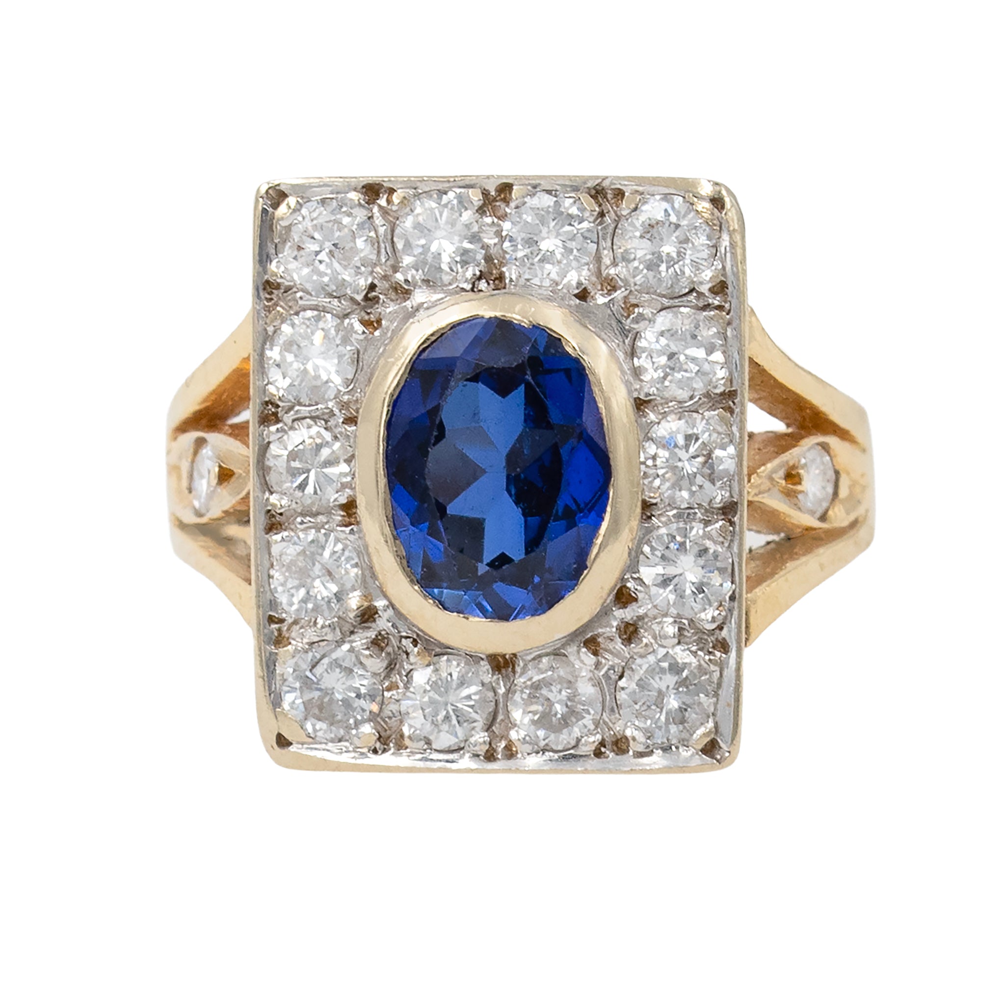 Oval Sapphire In Squared Diamond Mounting