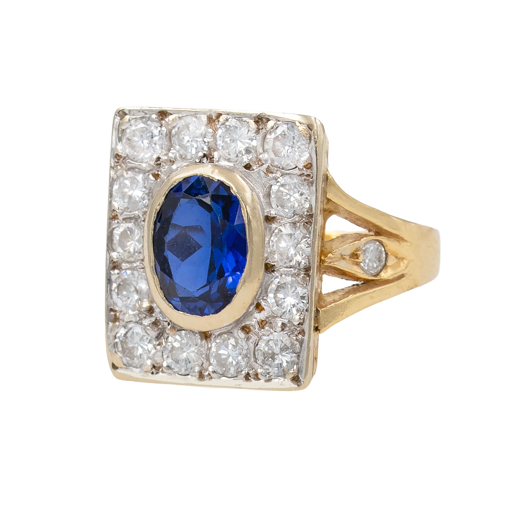 Oval Sapphire In Squared Diamond Mounting