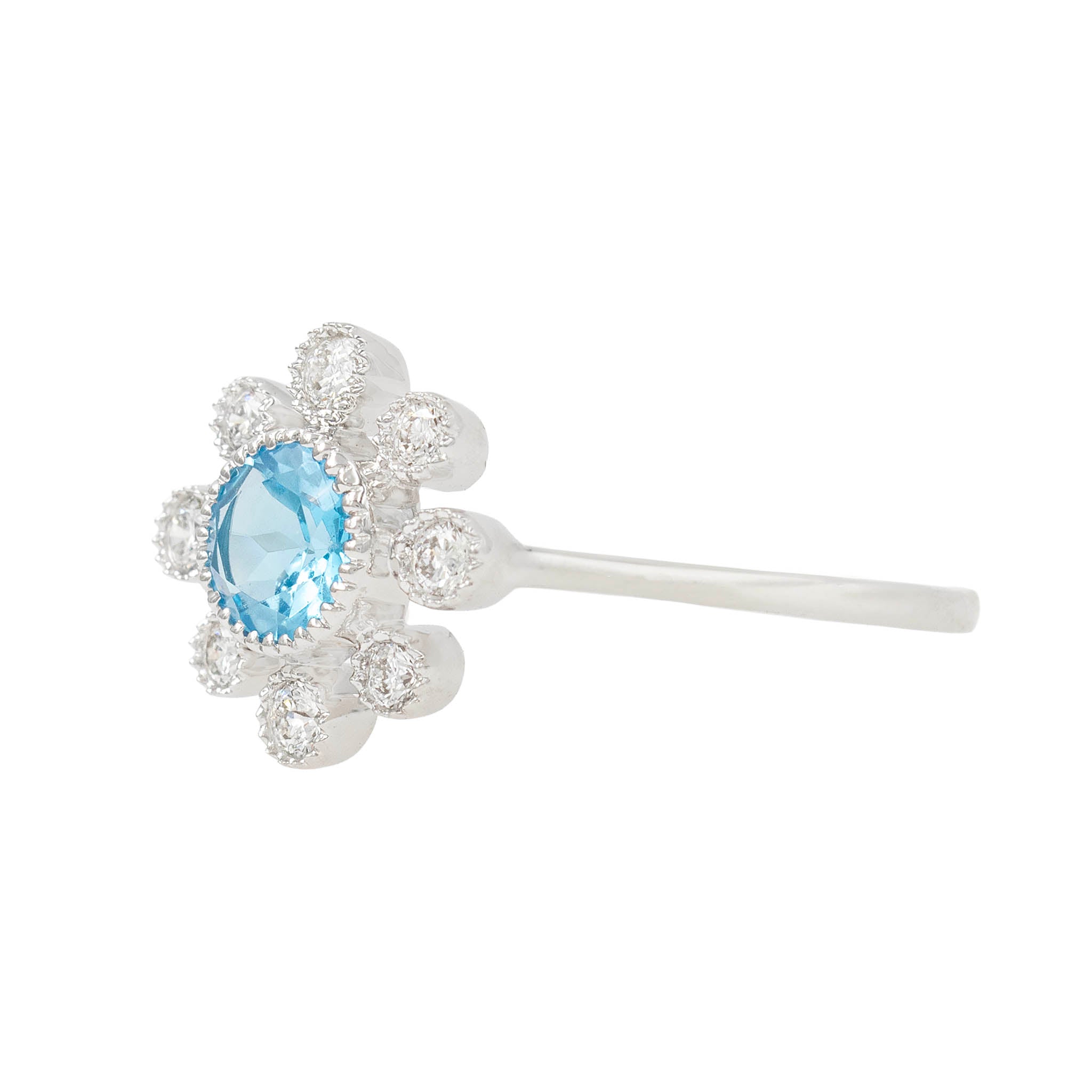 Blue Topaz And Diamond Flower Ring