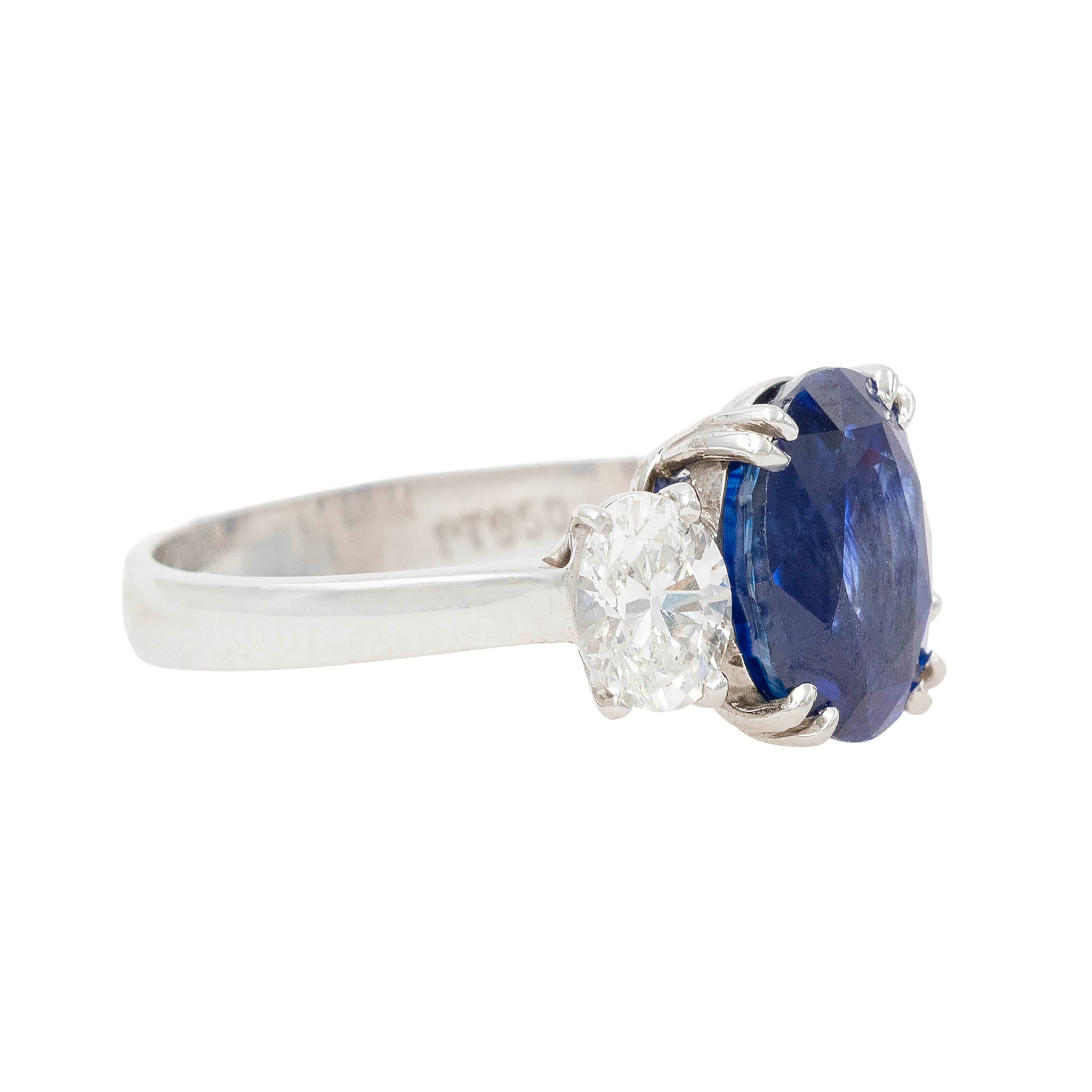 Oval Sapphire With Oval Side Diamonds Ring