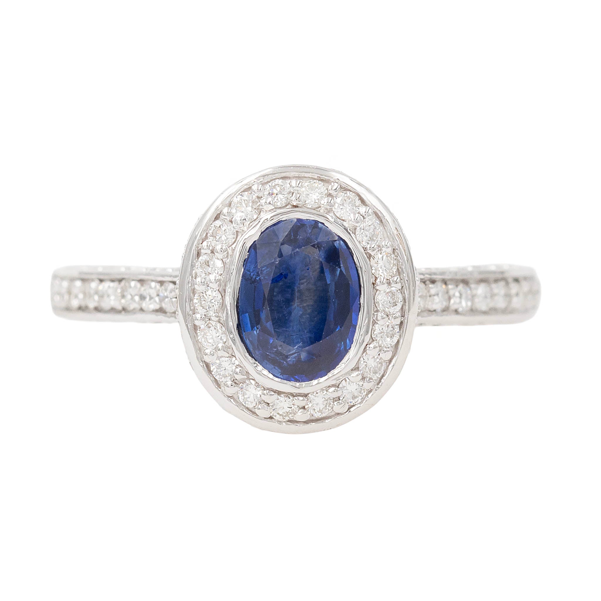 Oval Sapphire In Channel Set Diamond Setting