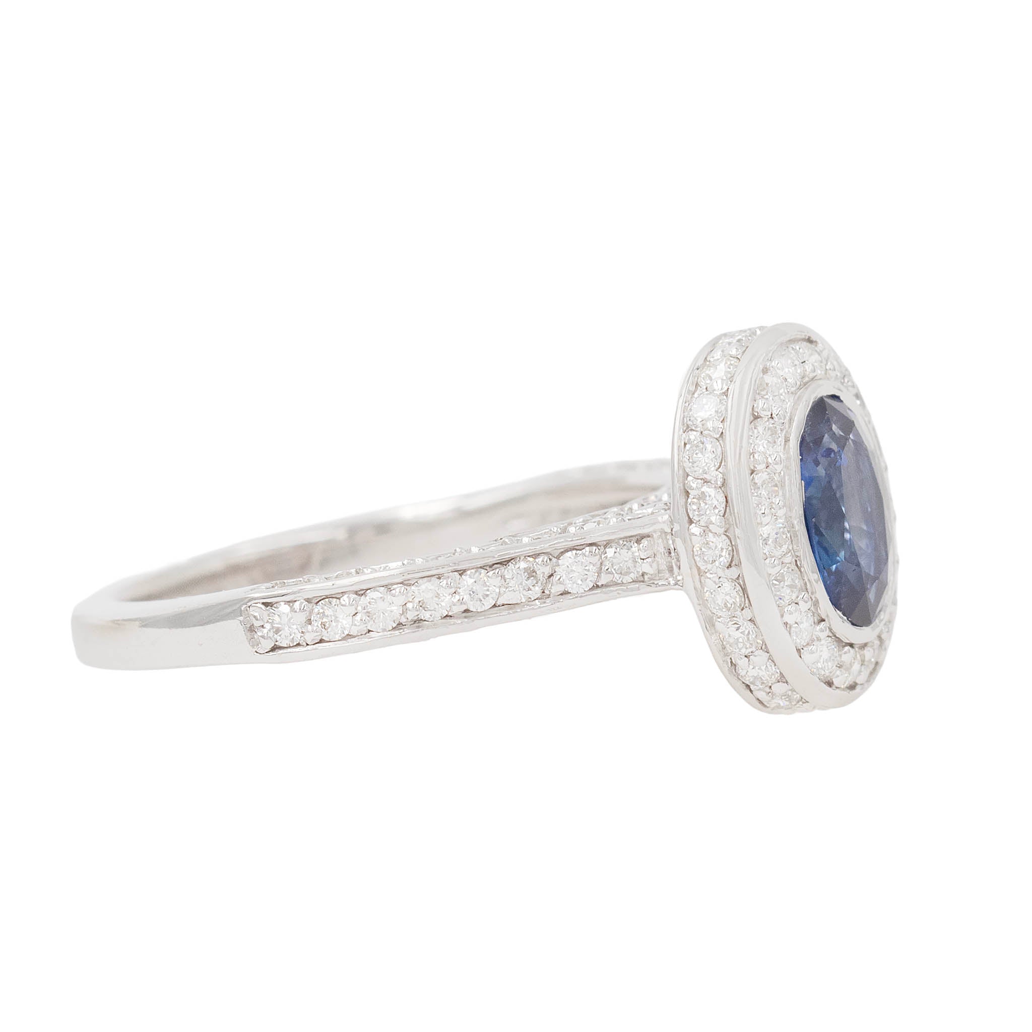 Oval Sapphire In Channel Set Diamond Setting